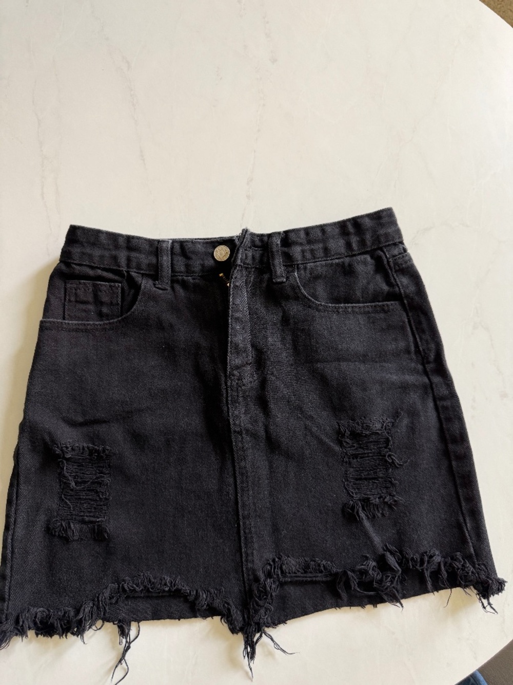Denim black skirt with rips